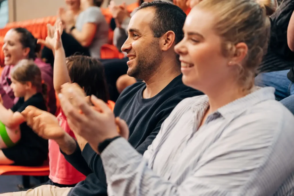 Spectators clapping